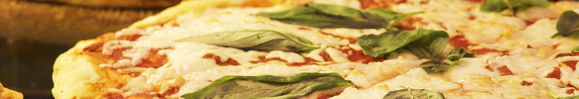 Eating Pizza Salad at Pizza by the Chef restaurant in Hollister, MO.